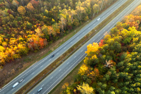 American highway in North Carolina Appalachian mountains in fall season with fast moving traffic. Interstate transportation conceptの写真素材