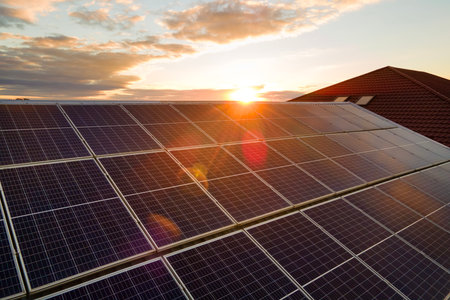 Commercial rooftop fully covered with photovoltaic panels, generating renewable electricity and...