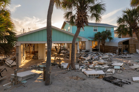 Natural disaster and its consequences. Hurricane destroyed houses roof and walls in Florida coastal...
