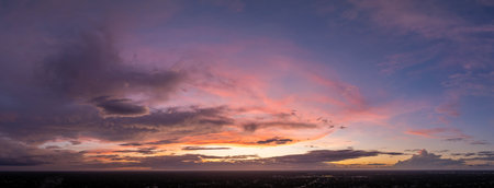 Evening sunset sky with colorful clouds. Panoramic skyscapeの写真素材
