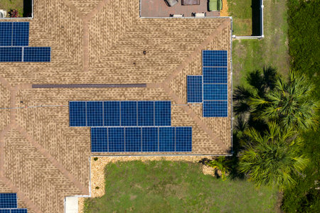 Autonomous home. Solar panels on house roof. Photovoltaic sells for producing clean ecological...