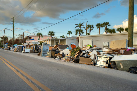 Consequences of natural disaster. Trash from severely damaged houses after hurricane storm surge....