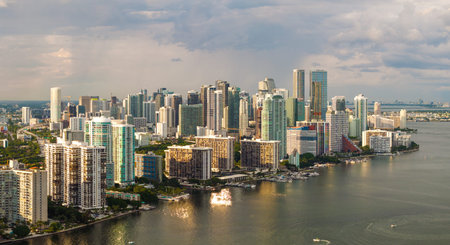 Miami, coastal city in Florida. Waterfront skyscraper buildings in downtown district of USA urban...