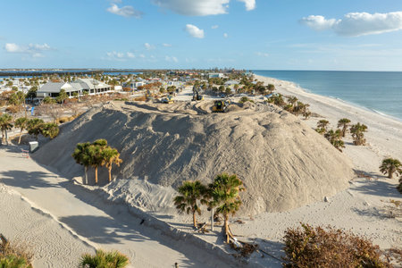 Sand recipient site for residents to dump sand after hurricane Milton storm surge. Huge sand piles...