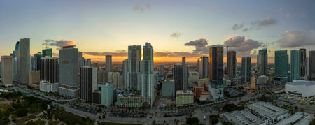Aerial view of downtown office district of of Miami Brickell in Florida, USA at sunset. High commercial skyscraper buildings and urban traffic in modern american megapolisの写真素材