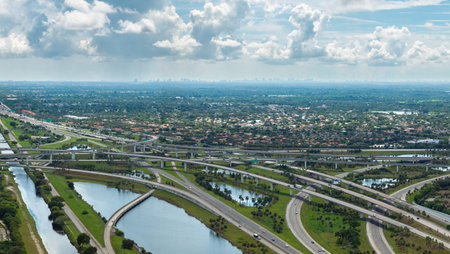 Elevated freeway intersection in American city of Miami, Florida with fast moving cars. USA...