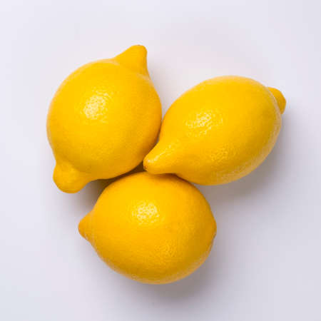 Close up of citrus lemon fruits isolated on white background.の写真素材