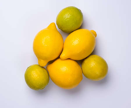 Close up of citrus fruits lemon and lime isolated on white background.の写真素材