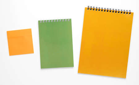 Bright colorful notepads isolated on white background.の写真素材