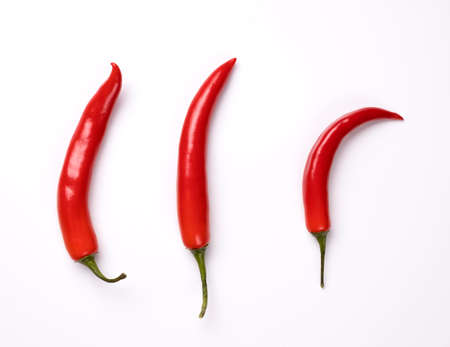 Red chili peppers isolated on white background.
