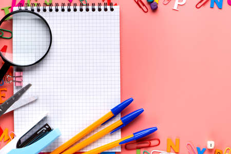 Many different school supplies on white copy space background. Back to school concept.の写真素材