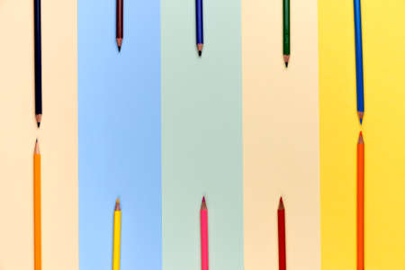 Many colorful drawing pencils on colorful paper copy space background.の写真素材