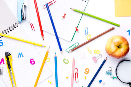 Many different school supplies on white copy space background. Back to school concept.の写真素材