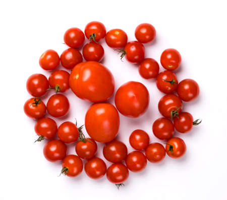 Ripe red tomatoes isolated on white background.の写真素材