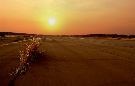 airport runway under the sunの写真素材