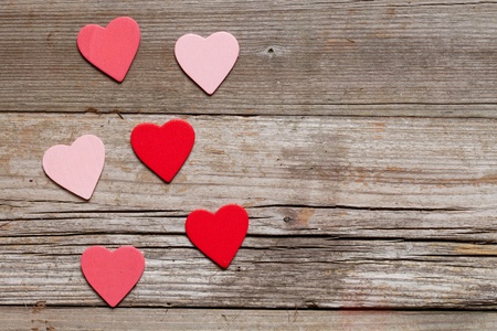 red hearts on rustic wood with copy space の写真素材