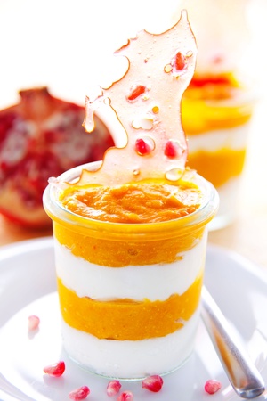 glass of delicious and creamy pumpkin soup の写真素材