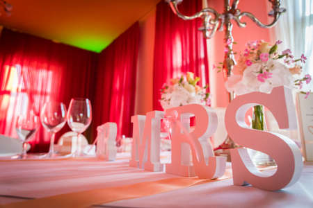 Mr. and Mrs. Sign on wedding tableの写真素材