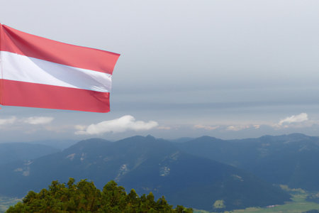 Austrian Flag in Mountain Landscape, Austriaの素材