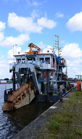 Dredging Vessel in the Fishing Port of Bremerhavenの写真素材