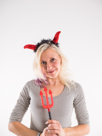Nice girl is wearing devil costumeの写真素材