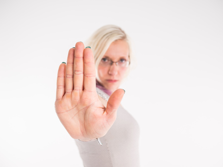 Young woman showing no with handの写真素材