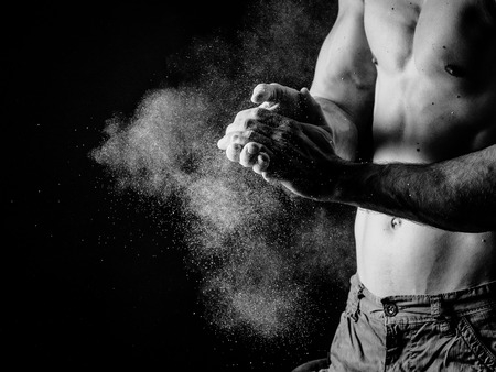 the young well-trained man has musclesの写真素材