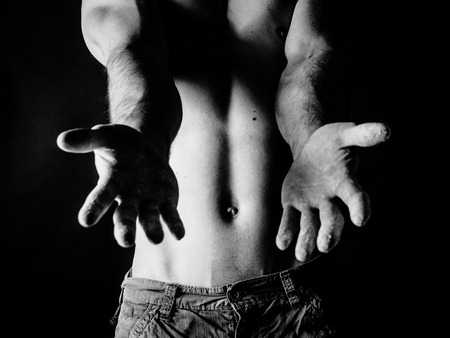 the young well-trained man has musclesの写真素材