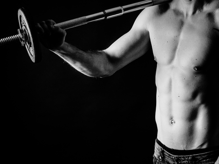 the young well-trained man has musclesの写真素材