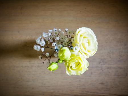 The vase with bouquet of beautiful flowers in room, closeup