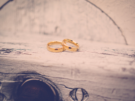 the golden rings on the wood, vintage,の写真素材