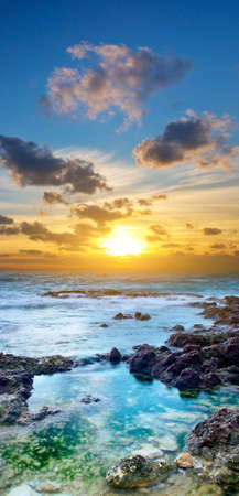 Beautiful seascape during bright sundownの写真素材