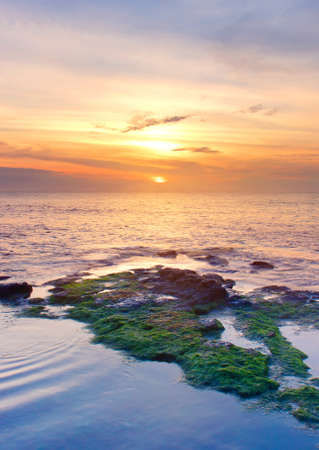 Beautiful seascape during bright sundownの写真素材