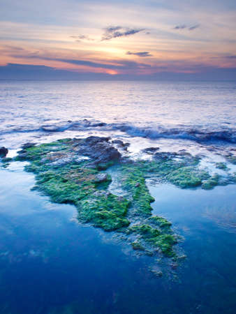 Beautiful seascape during bright sundownの写真素材