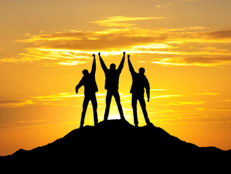 Silhouette of the winners teamの写真素材