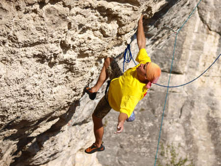 Rock climber on the mountainの写真素材