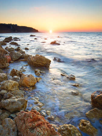 Bright seascape during sunsetの写真素材