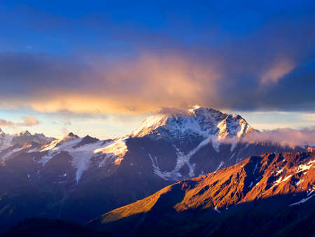 High mountains during sundownの写真素材