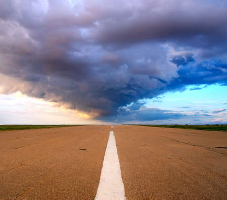 Road and dark skyの写真素材