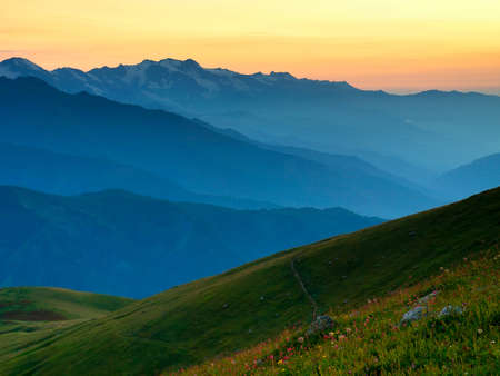 Hills during sundown in the mountain valleyの写真素材