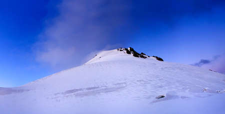 High snowy mountains during sunset  Beautiful landscape