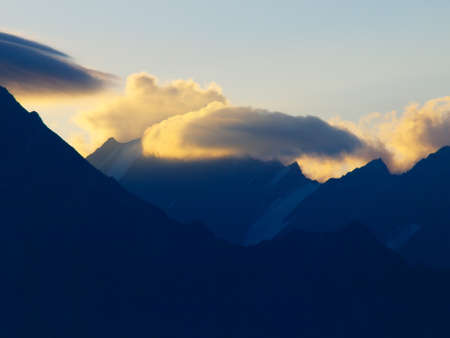 Cloudy mountain during sunriseの写真素材