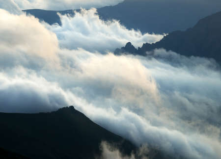 Cloudy mountain during sunriseの写真素材