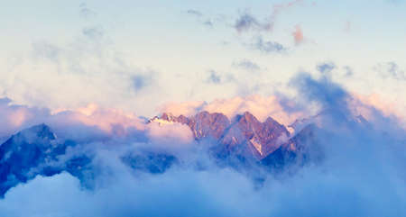 High mountains and clouds during sunrise  Beautiful landscapeの写真素材