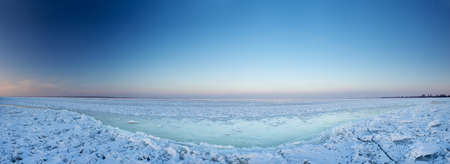 Icy plain and sky  Panoramic landscapeの写真素材