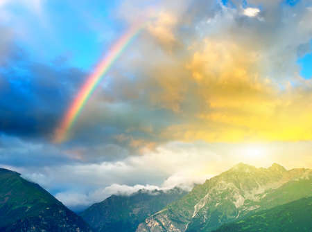 Rainbow in the mountain valleyの写真素材