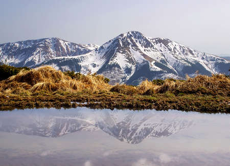 Mountains and reflection in lakeの写真素材