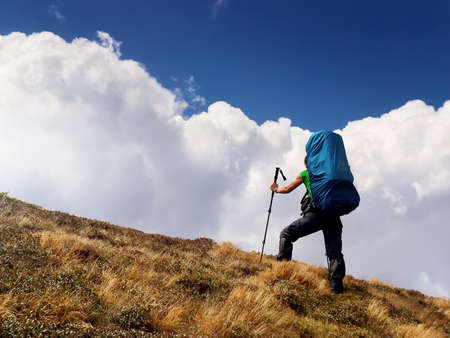 Tourist on peak of mountain  Active life concept