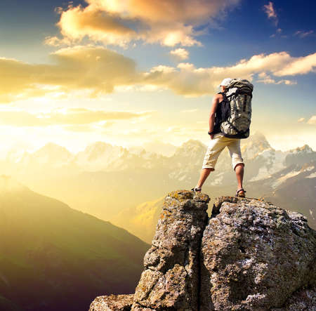 Tourist on rock Sport and active life concept Tourist on rock Sport and active life concept