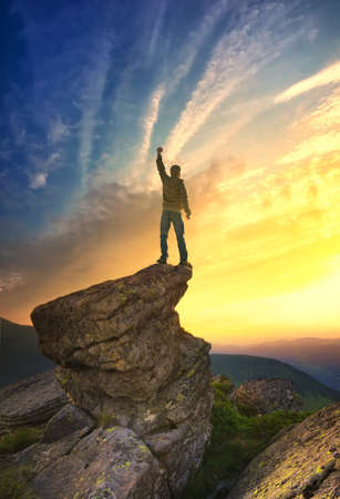 Climber on the mountain top. Sport and active  life conceptの写真素材